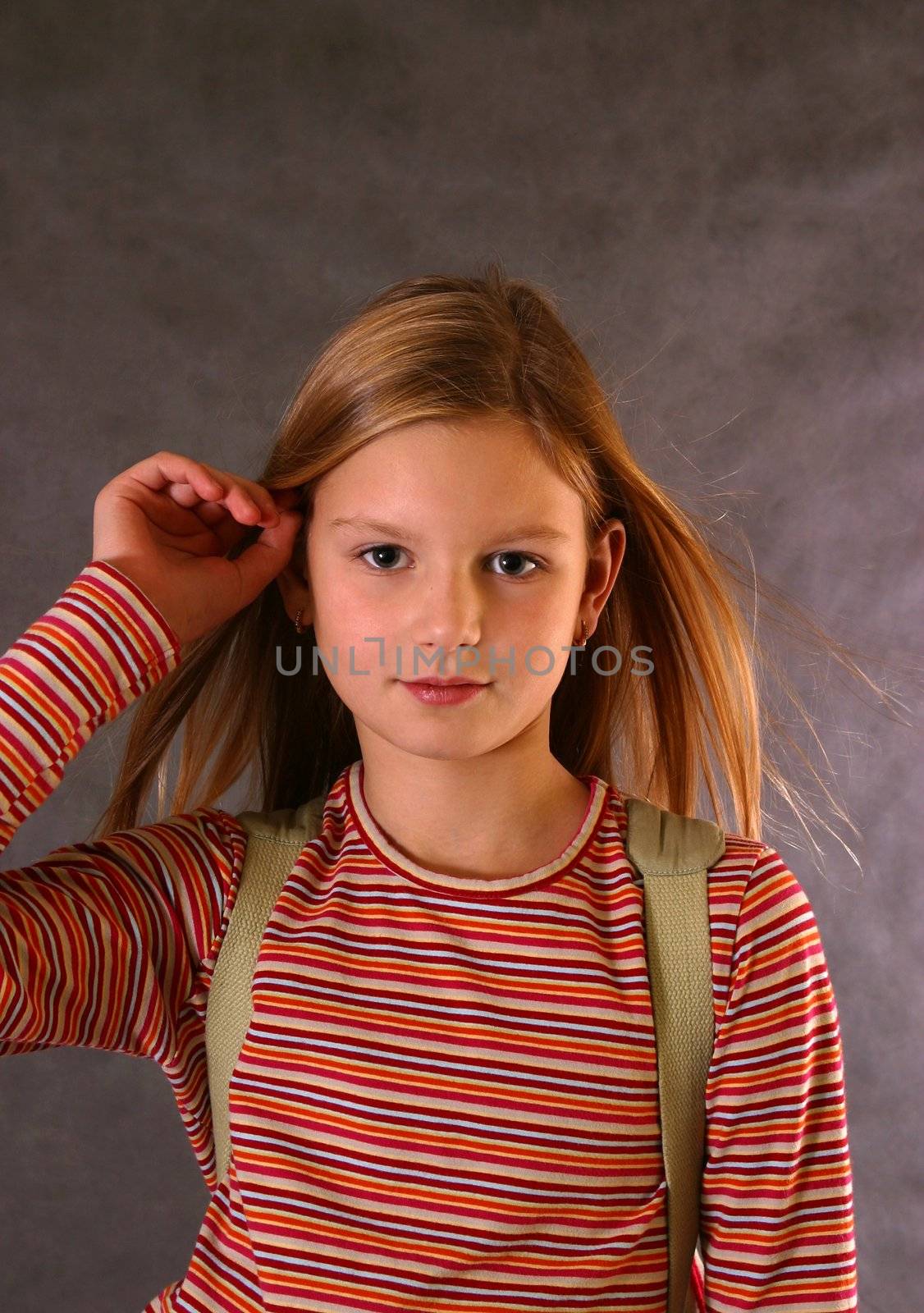 Portrait of the girl with fluttering hair 