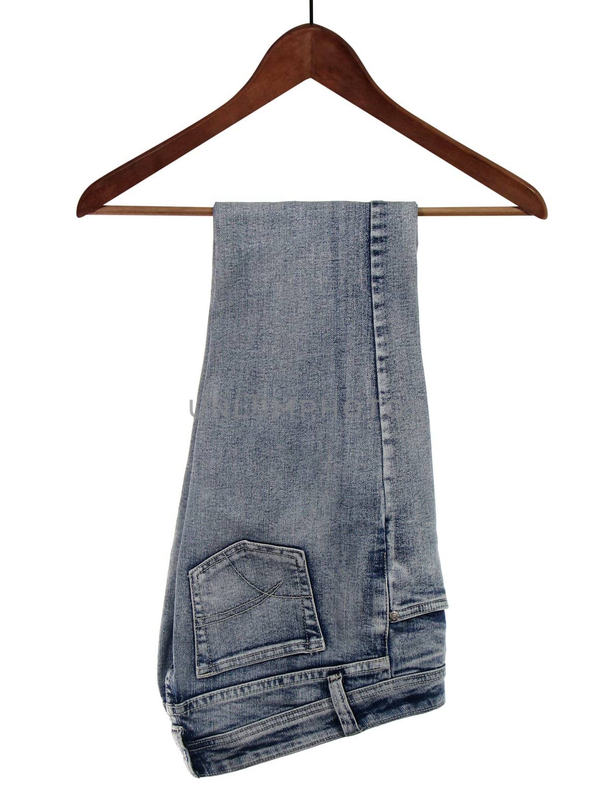 Jeans on wooden hanger by anikasalsera