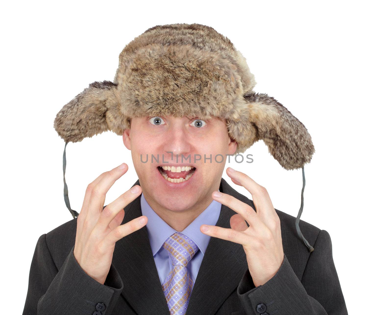 Emotional man on a white background with a winter hat on head