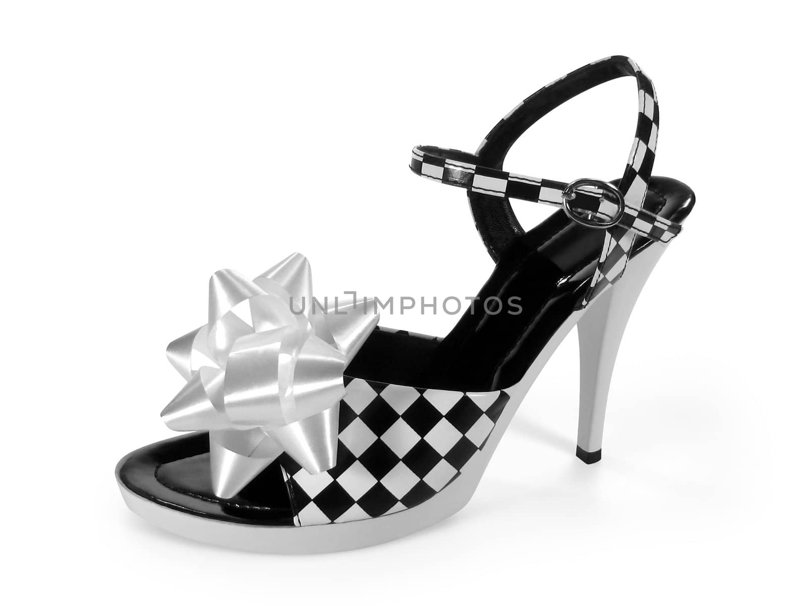 Sexy leather high heel shoe with a white gift bow isolated on white background. Image includes two clipping paths, one of the shoe with the bow and one of the bow only.