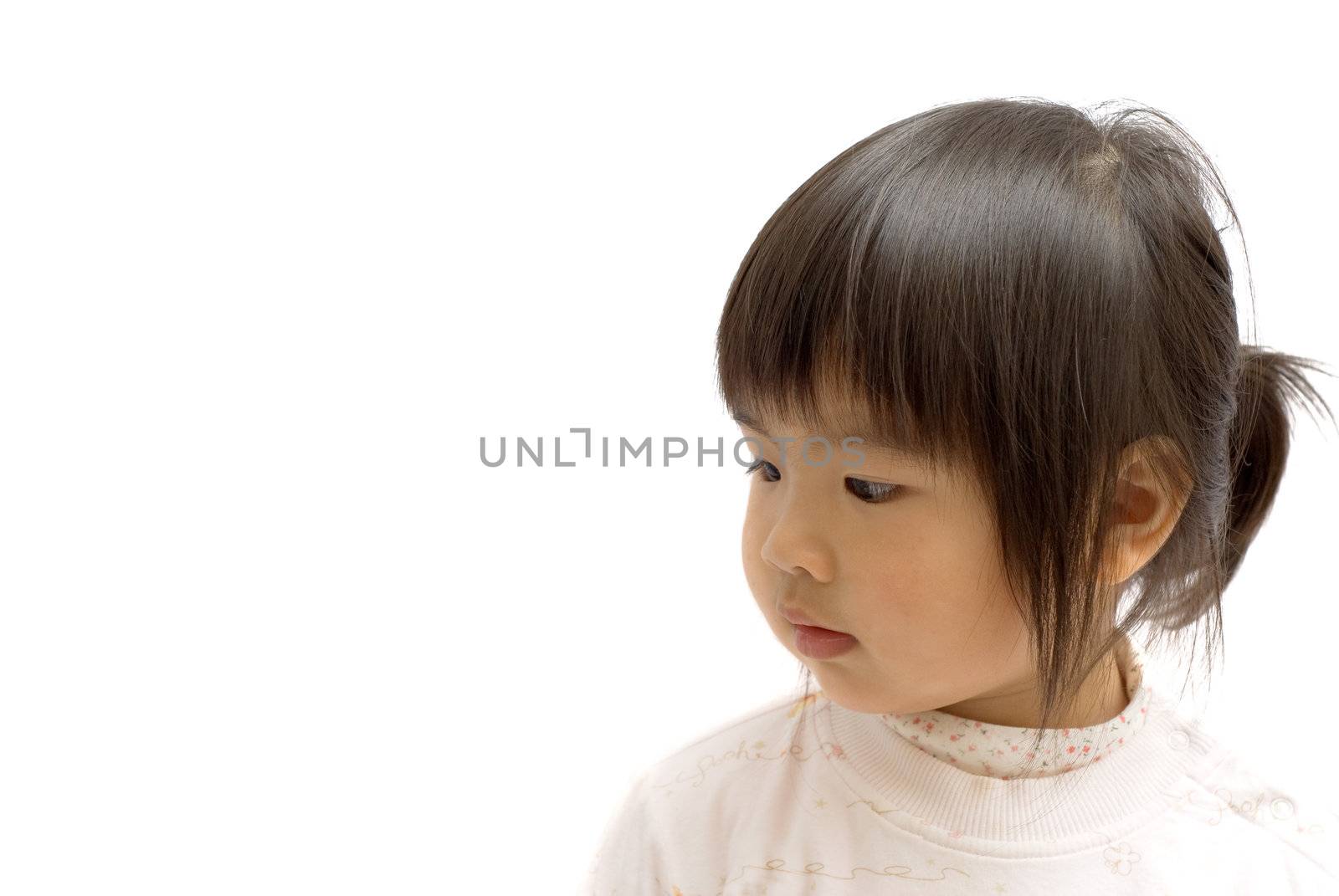 Asian cute child with black hair and yellow skin face on white background.