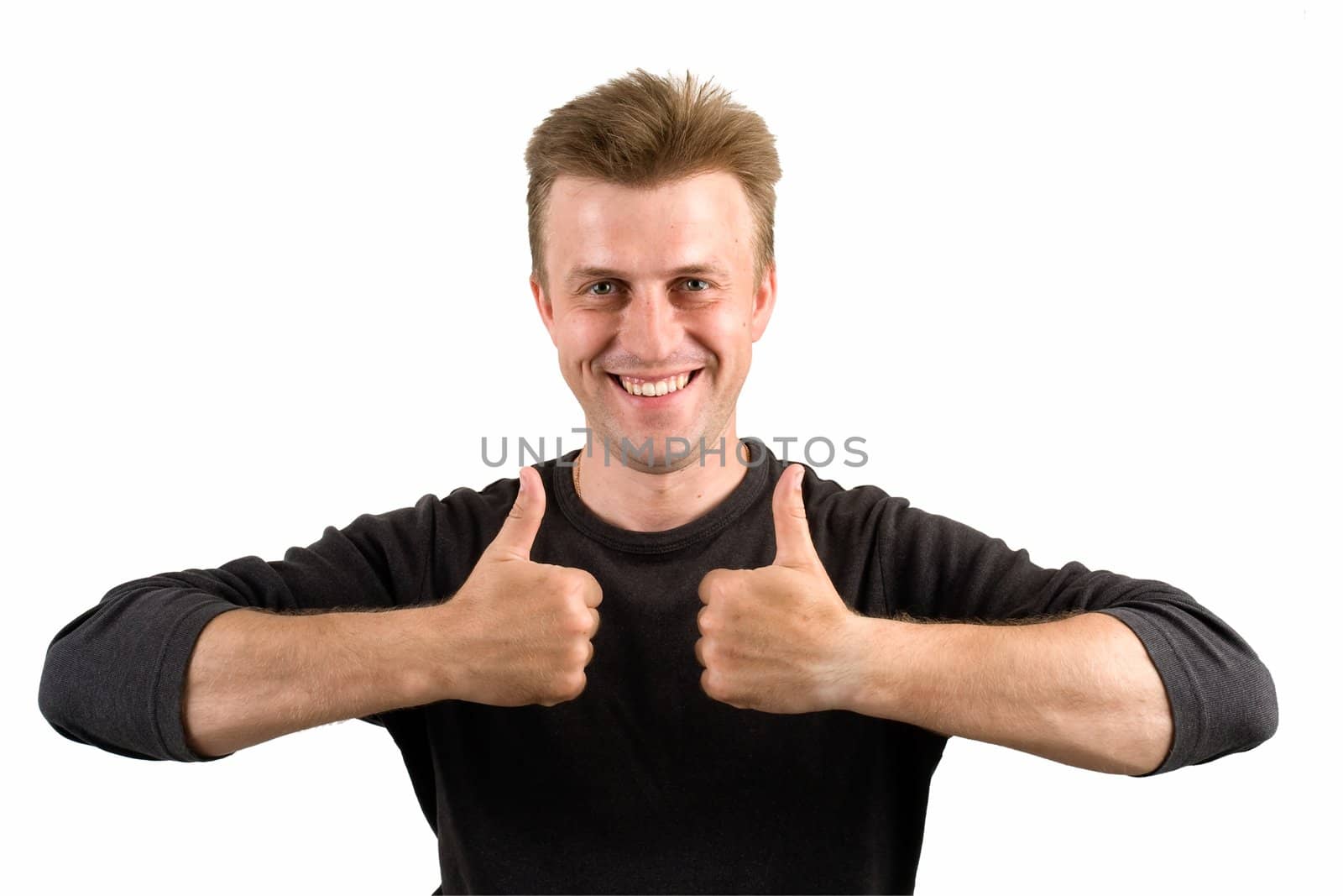 smiling young man with thumbs up on a white background