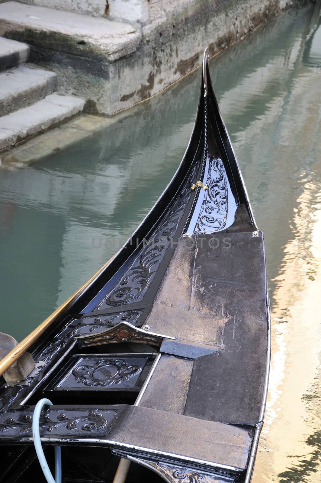 Front part of a gondola in Venice, Italy 