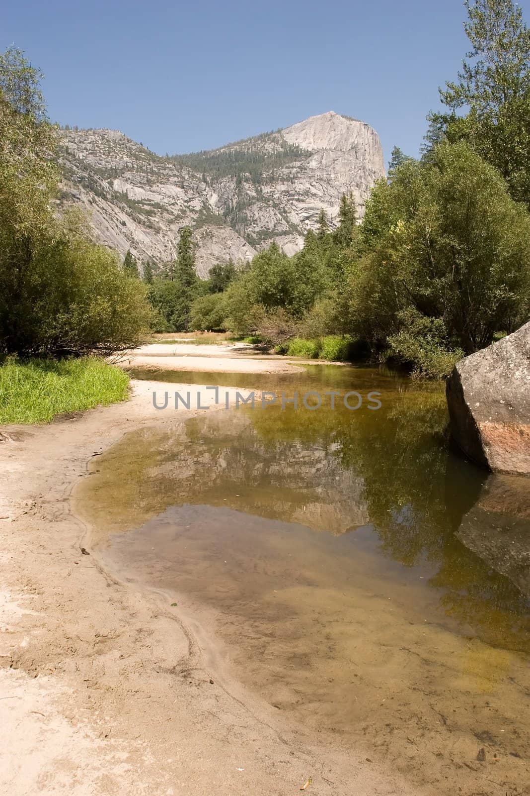 Mirror Lake is a lake in Yosemite National Park in California. This seasonal lake is close to disappearing due to sediment accumulation.