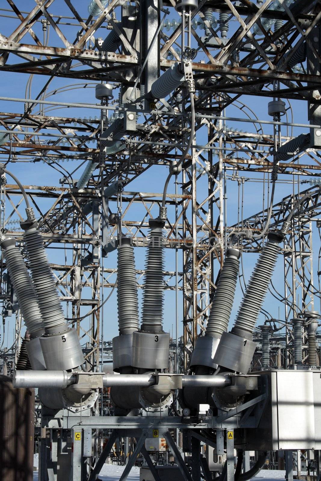 Insulators and metallic constructions of a high voltage electricity plant.