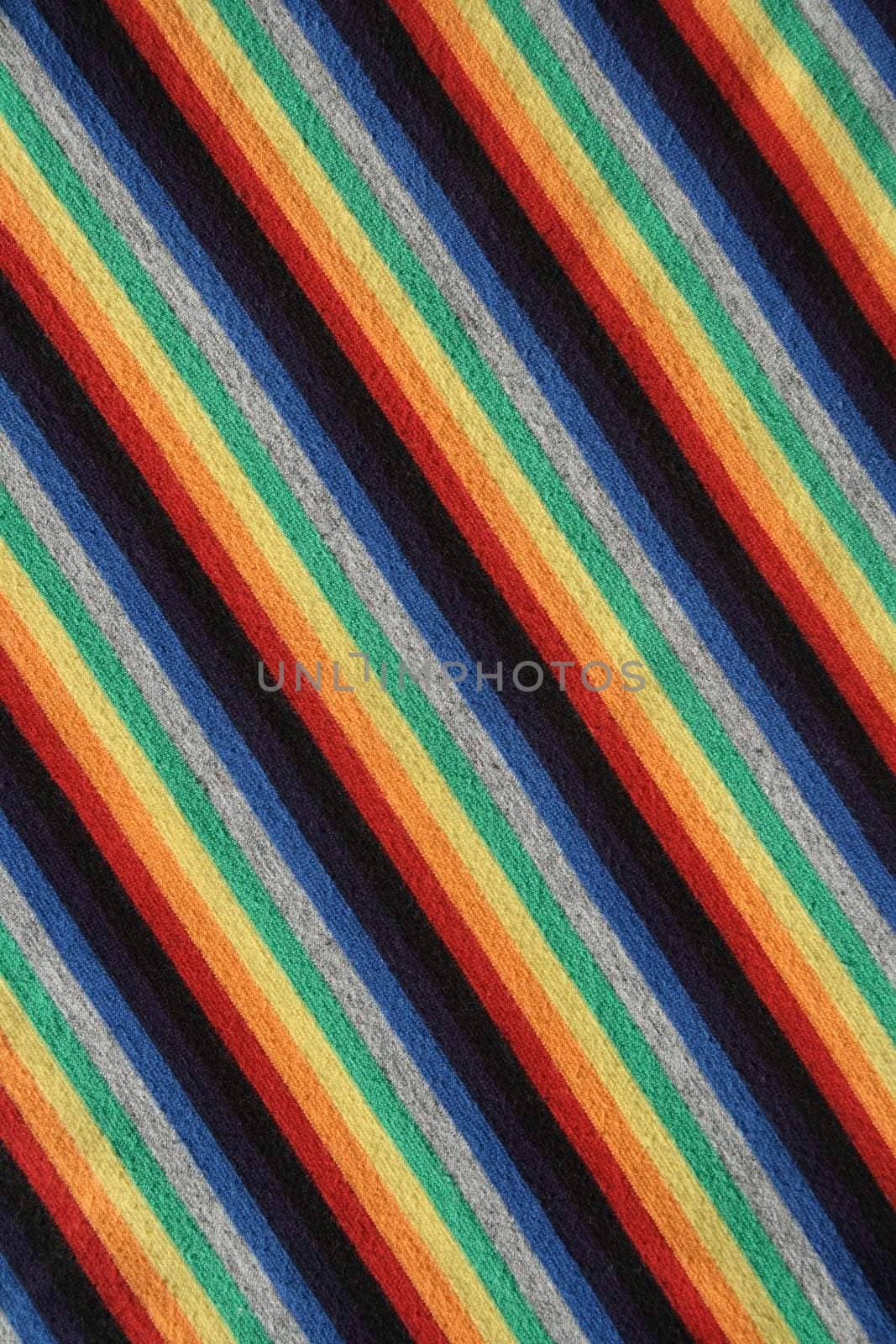 Colorful striped fabric background. Diagonal stripes.