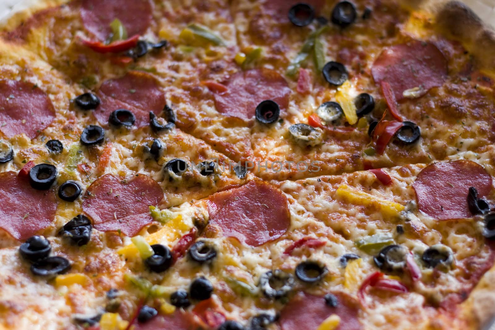 pizza witha salami and olives