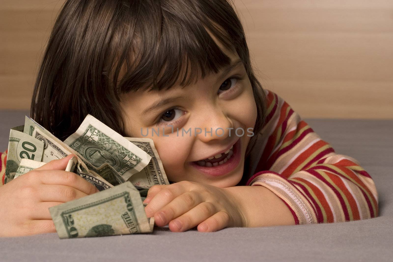 child and dollars child smile