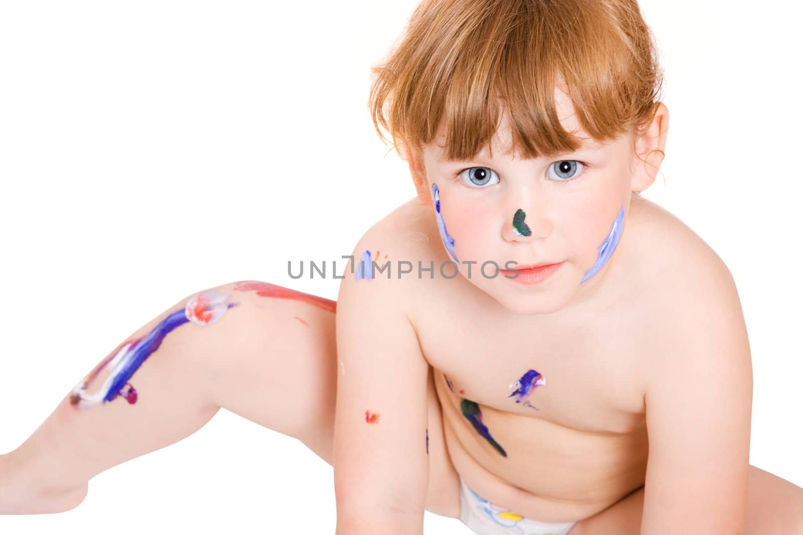 a girl with dirty face of paint seat on the floor