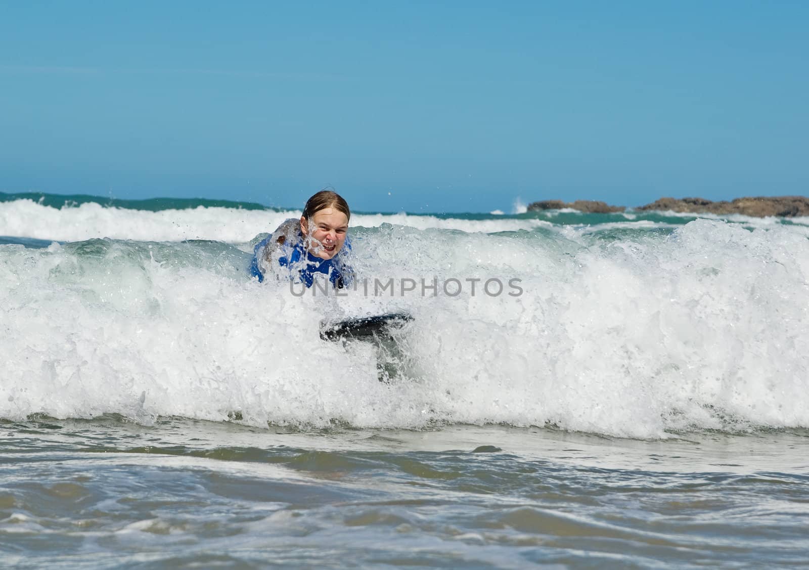 girl in the waves by clearviewstock
