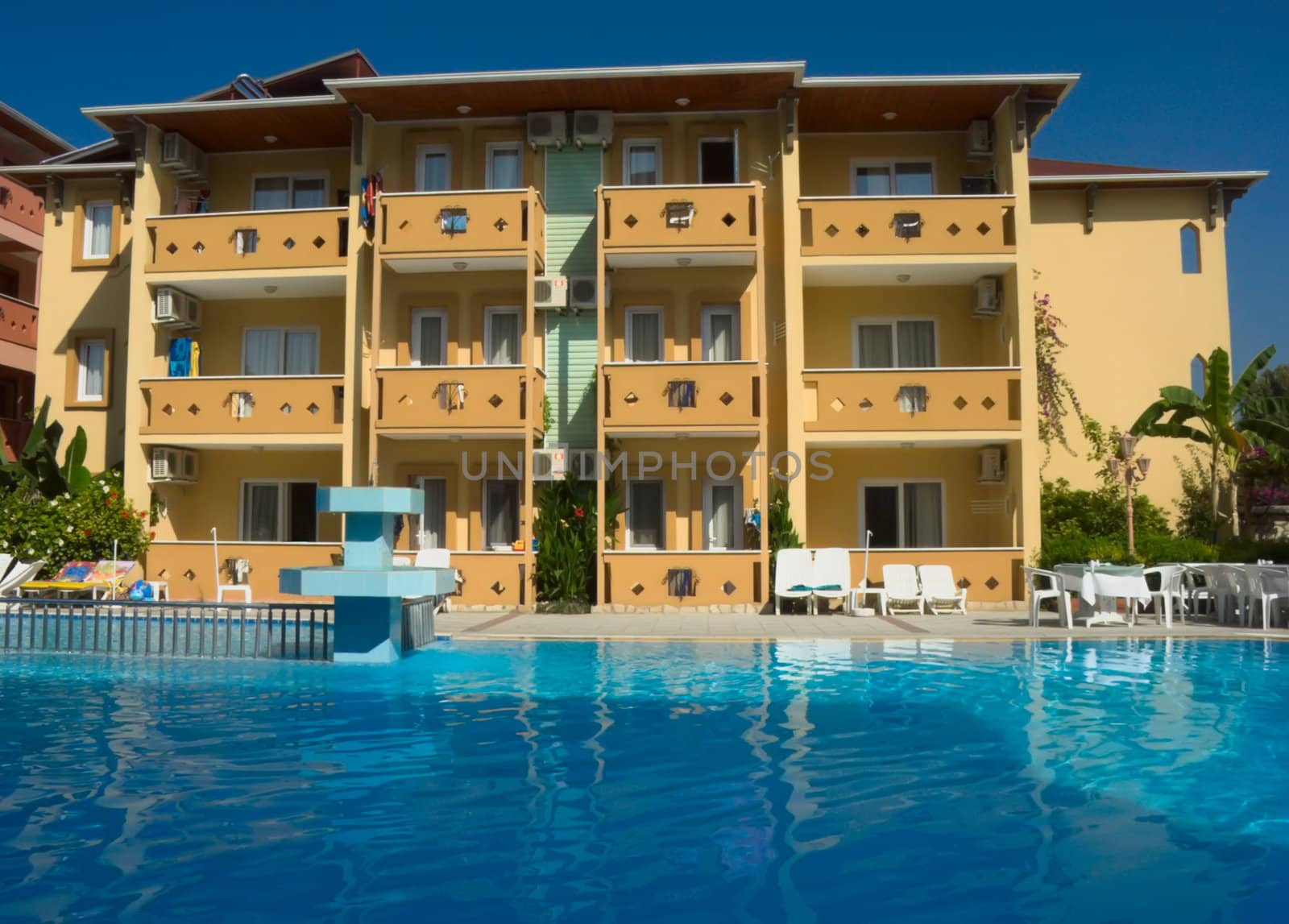 a hotel building with the pool