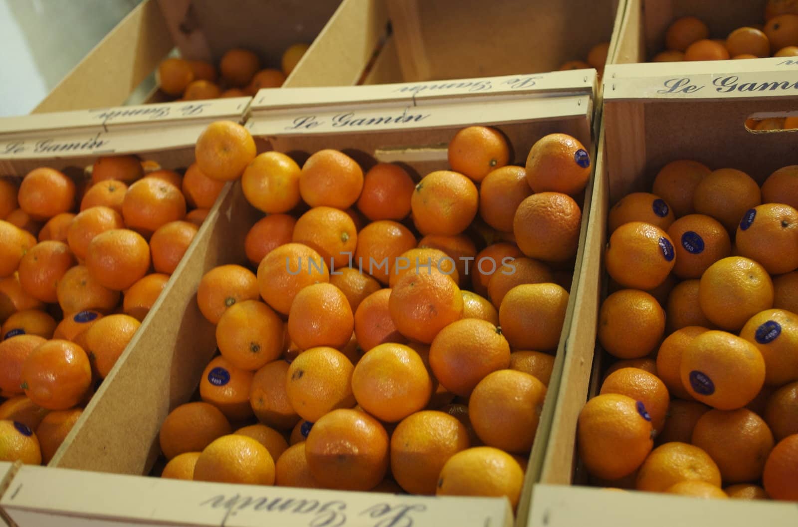 Boxes of oranges outside a French greengrocers
