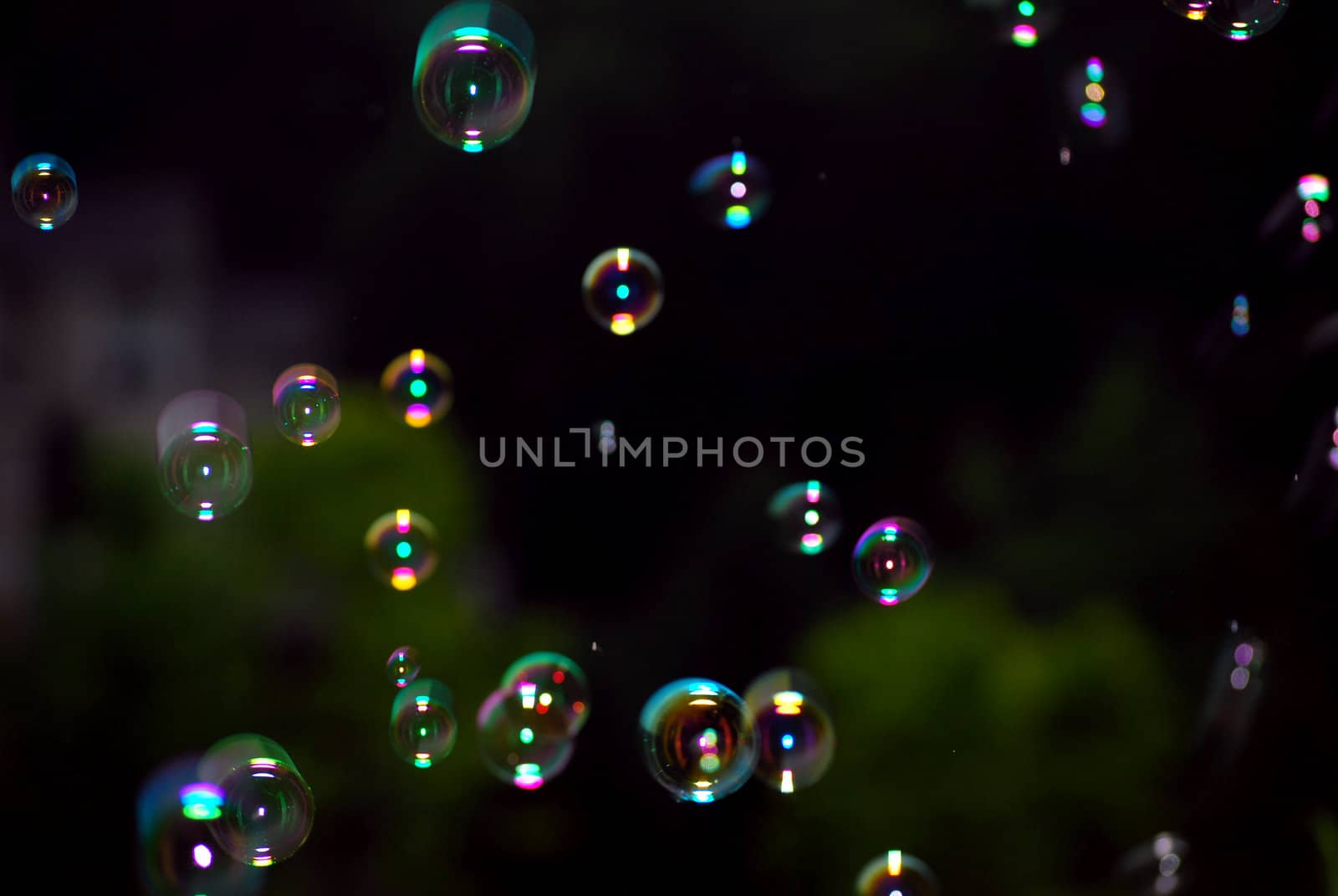 Bubbles floating around at night