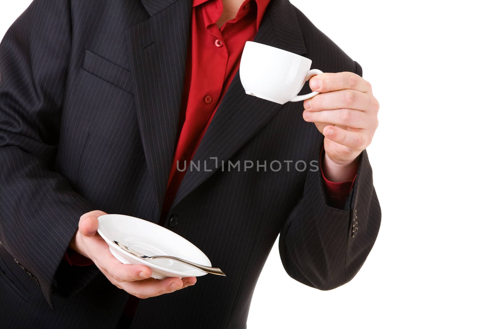 white coffee cup in the hand of the man