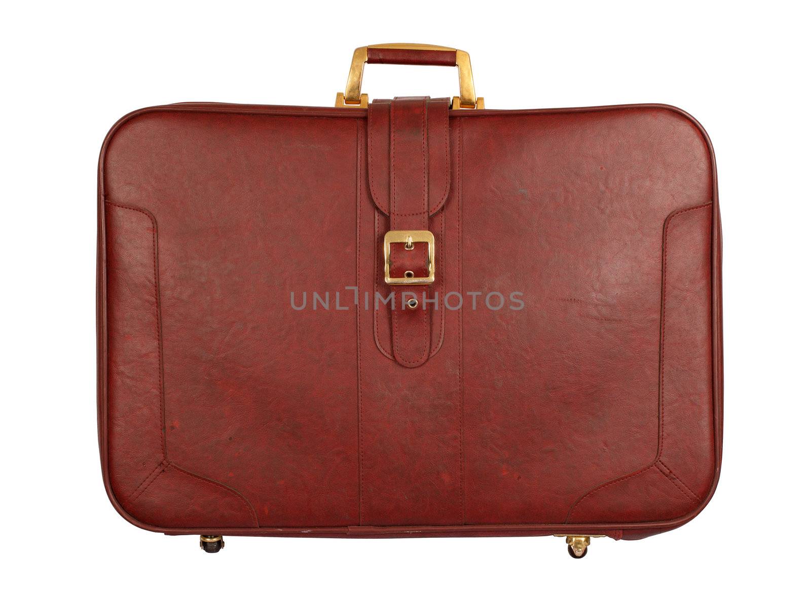 An old suitcase from the seventies.  Isolated with clipping path included.
