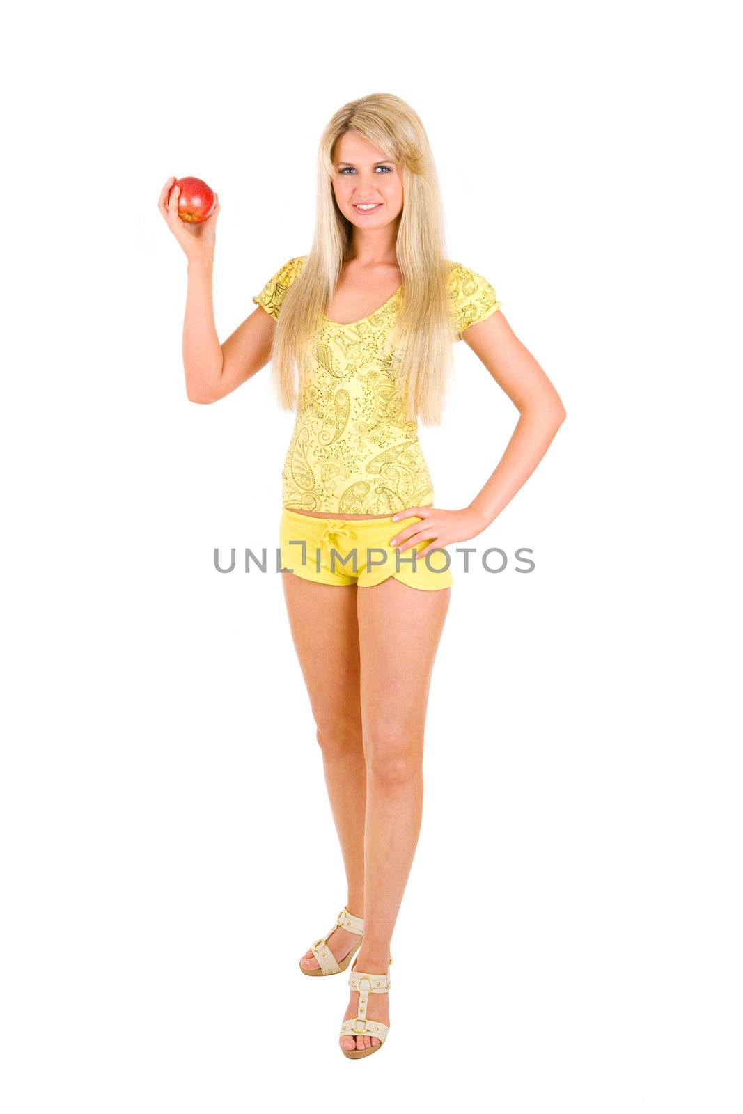 long haired and long legs blond sportive girl with an apple