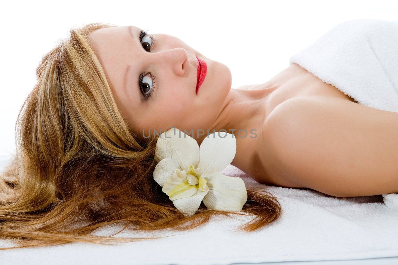 Attractive woman getting spa treatment on white