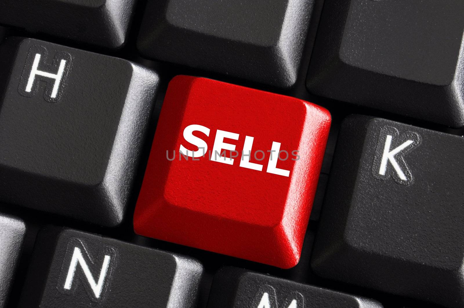 sell written on keyboard showing business or finance concept