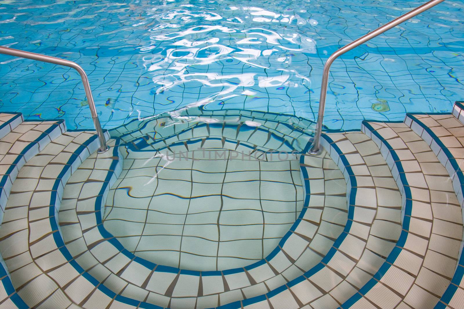 Picture of indoor swimming pool with interesting details.