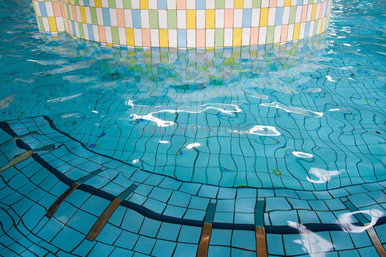 Picture of indoor swimming pool with interesting details.