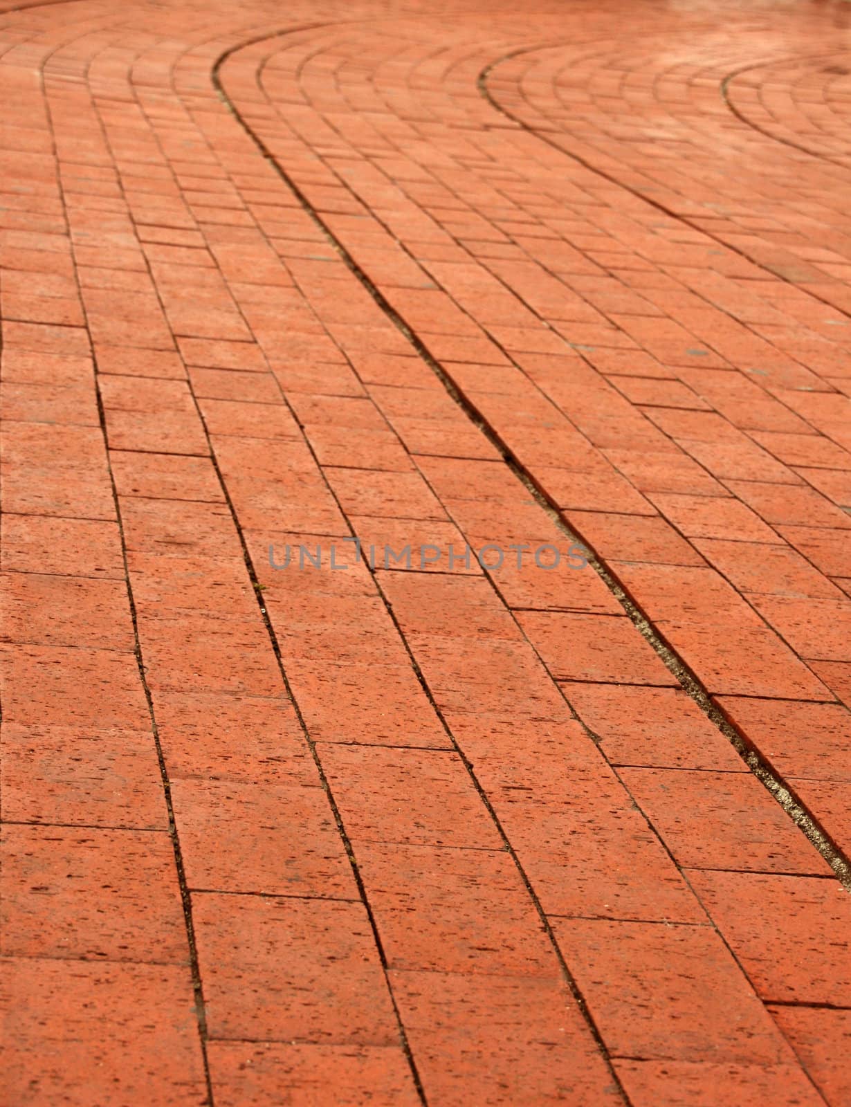 background of a curve red orange brick wall