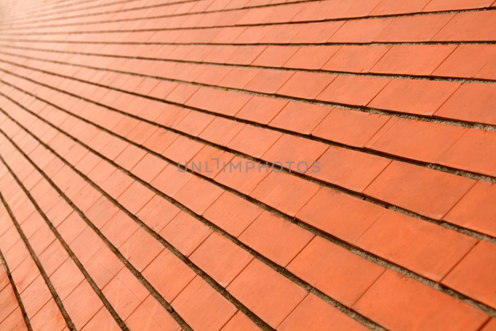 background of a diagonal red orange brick wall