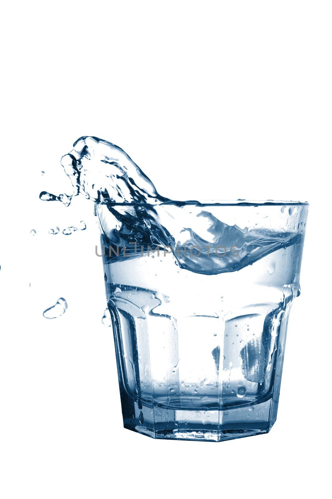 cold splashing water drink with ice cube