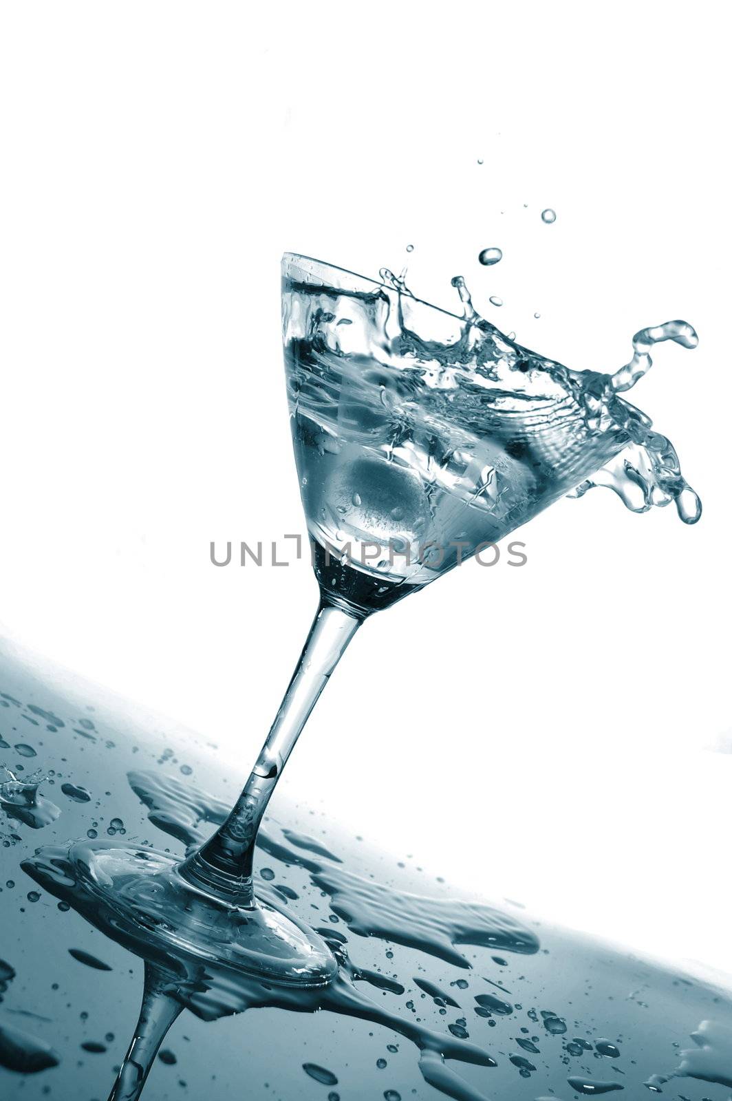 glass of water as a summer drink with ice cube