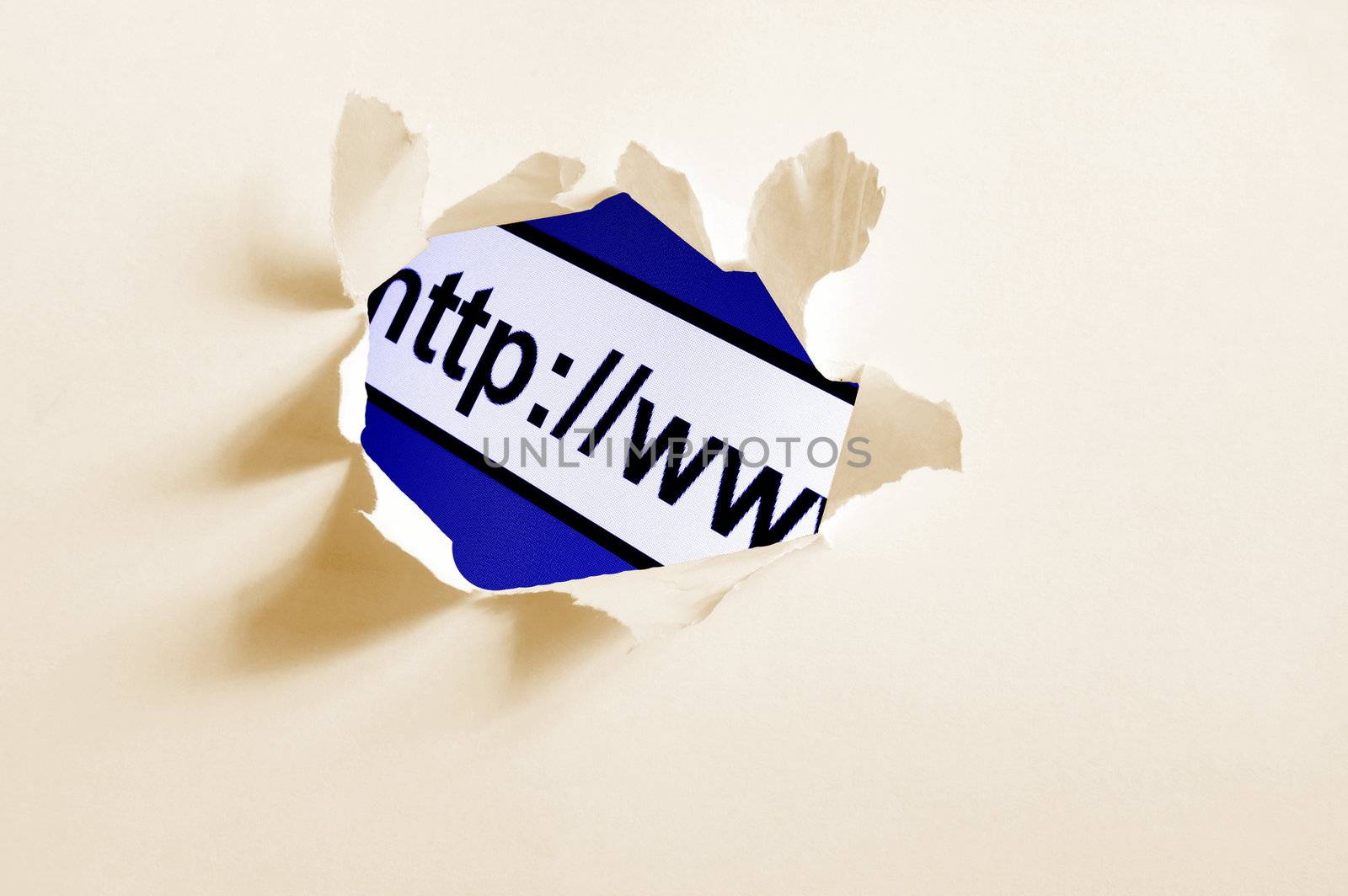 internet concept behind hole in blank paper