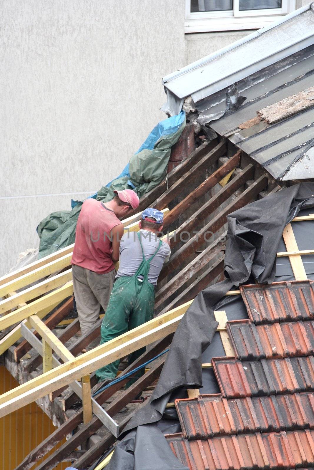 Carpenters working on a roof
