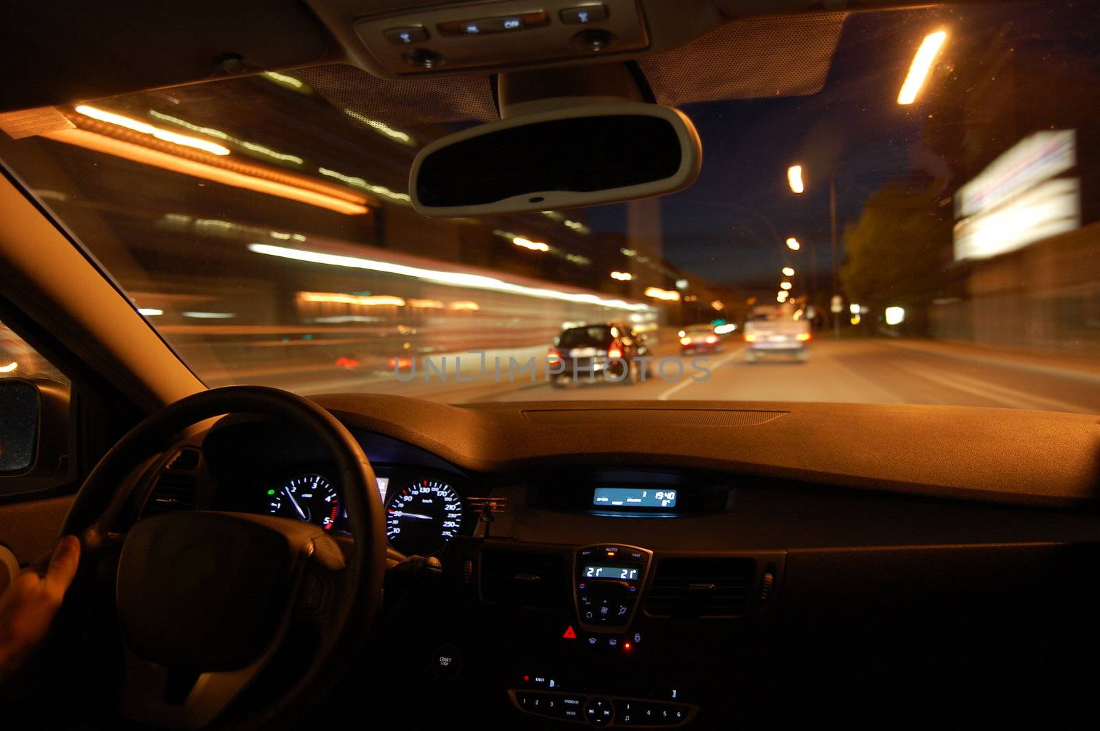 night drive with car in motion through the city shows the speed