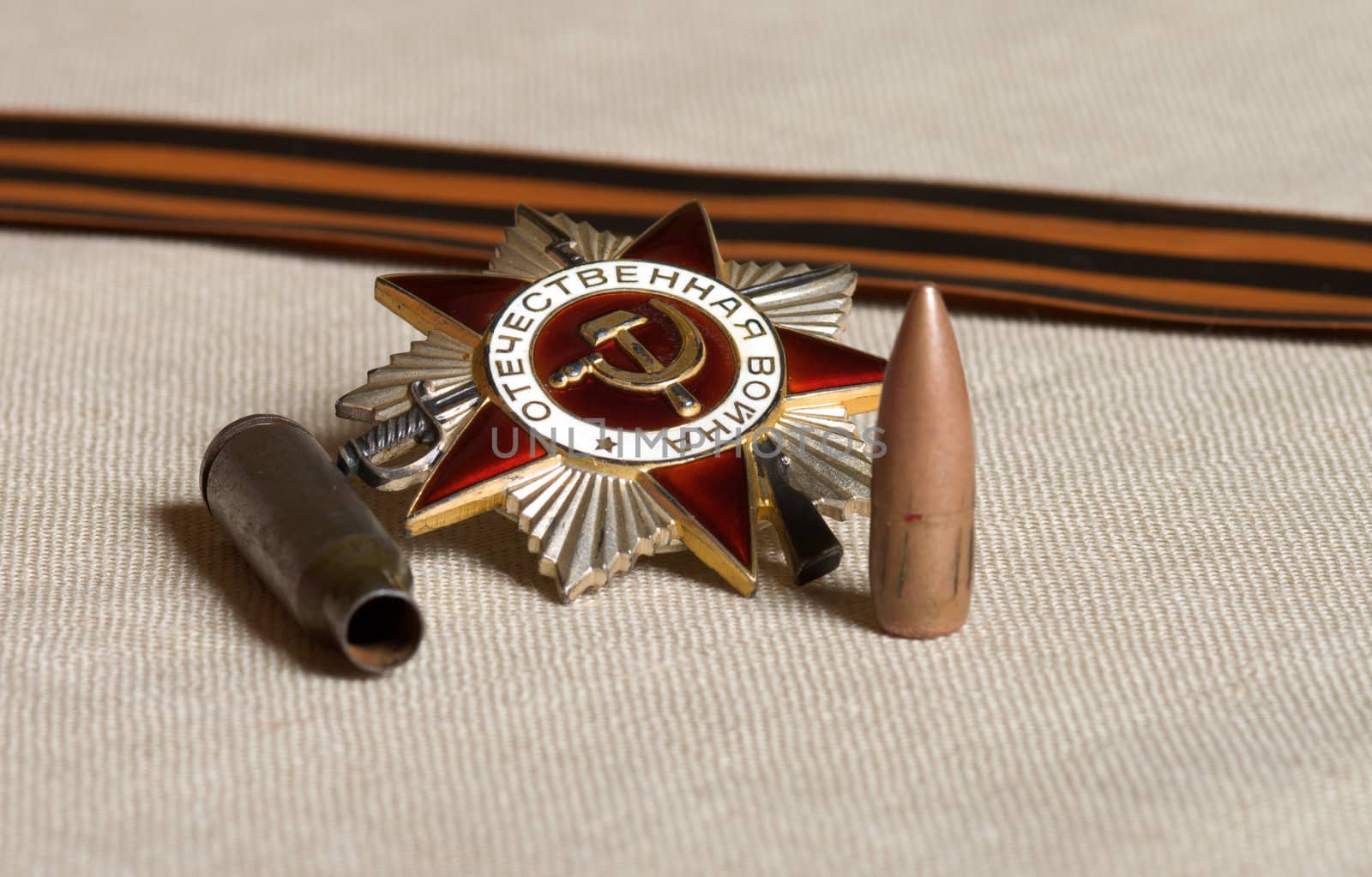 Bullet, shell casing Order of the Patriotic War and the Ribbon of Saint George.