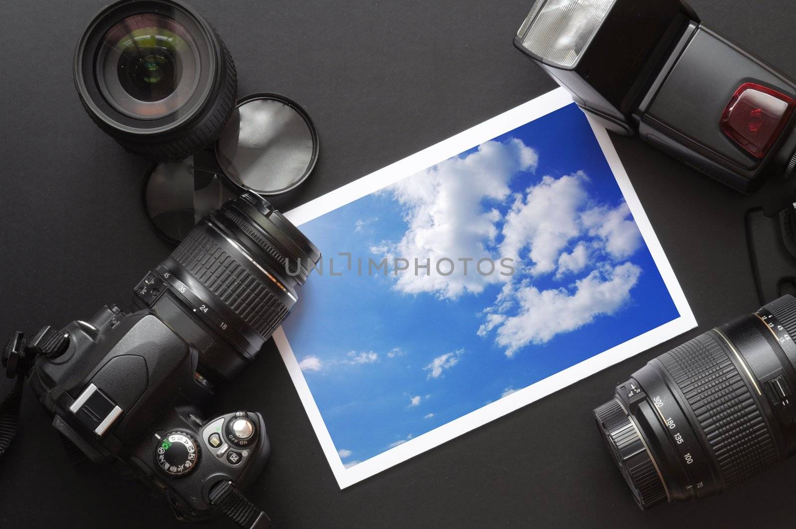 dslr camera lens and image on black background