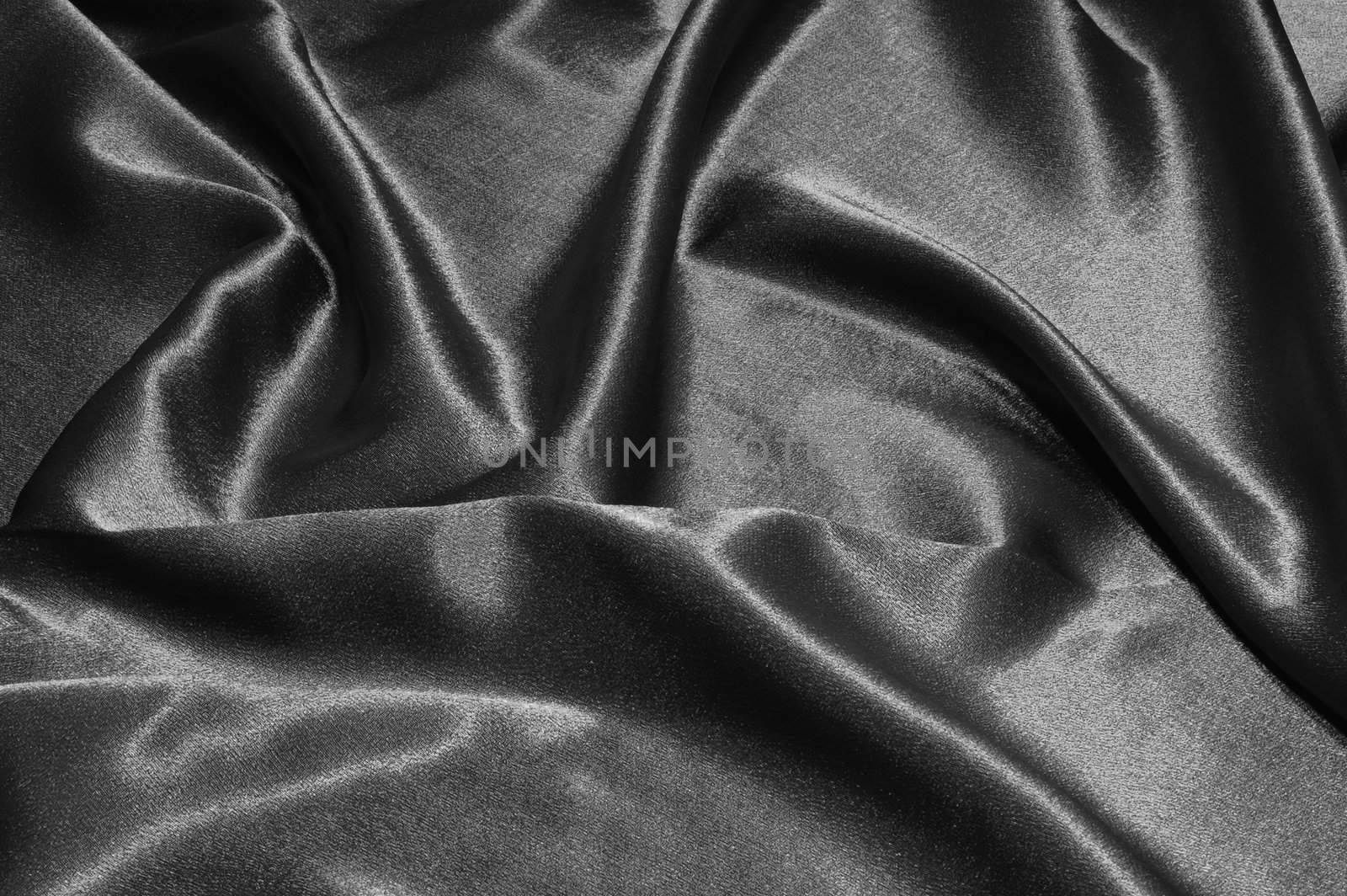 black satin or silk background with textile texture