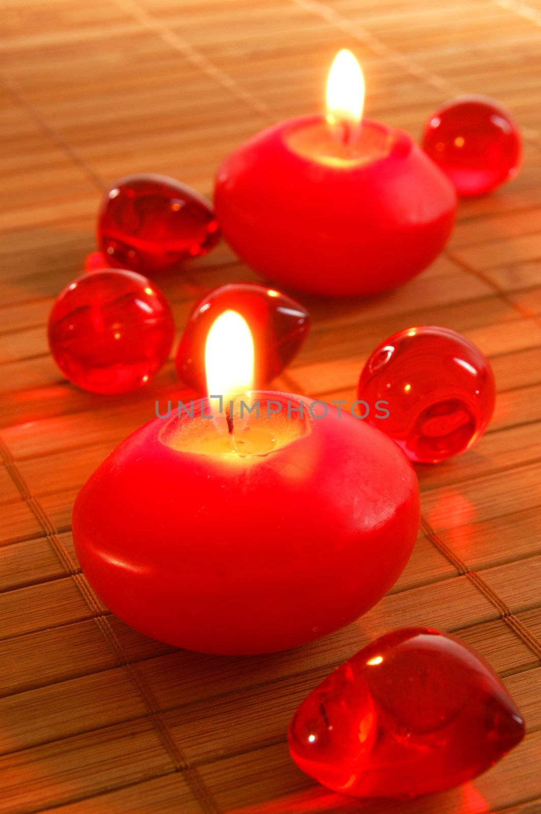 red spa candle and red bath decoration