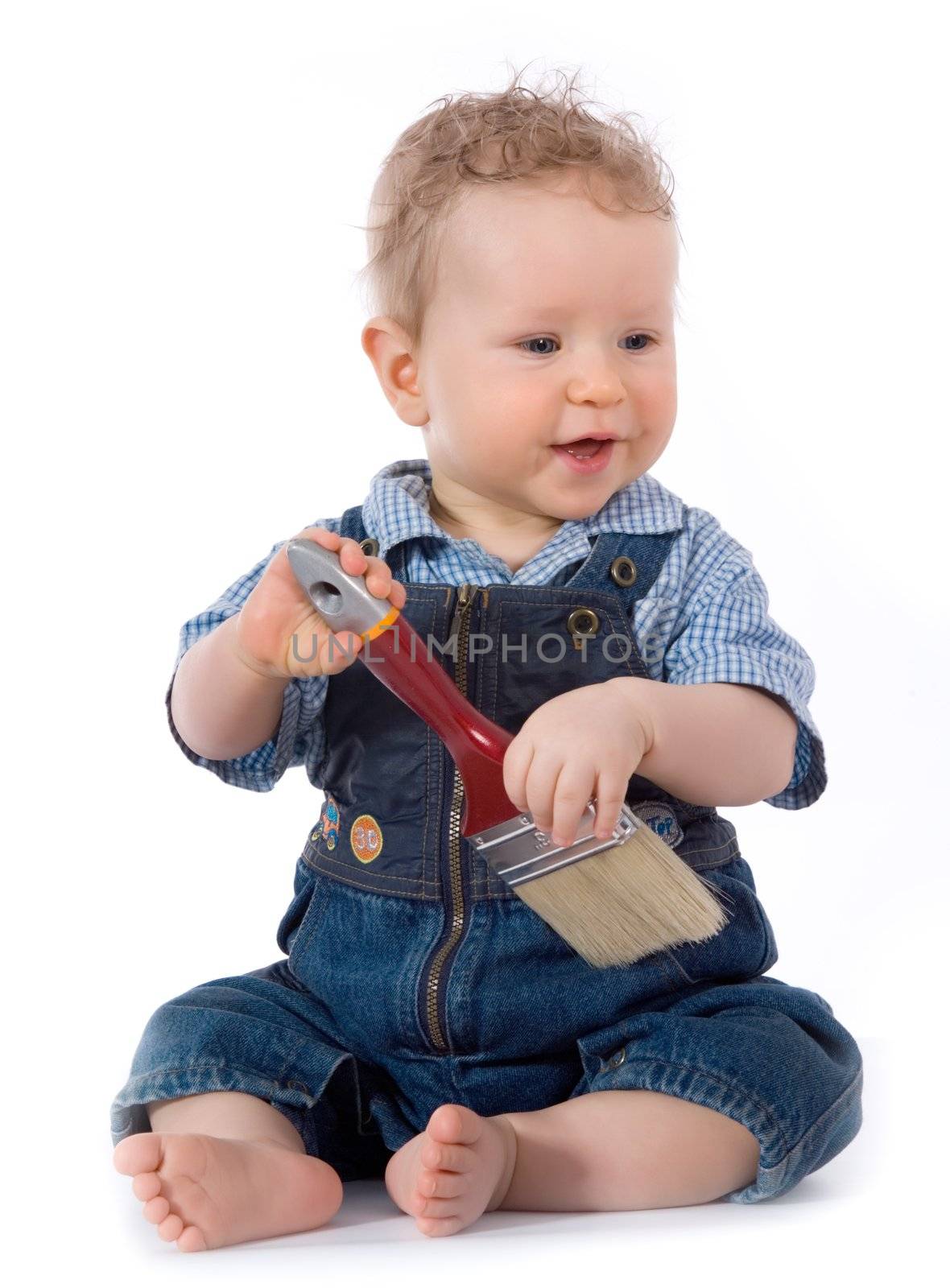 Beautiful baby with paint brush on white