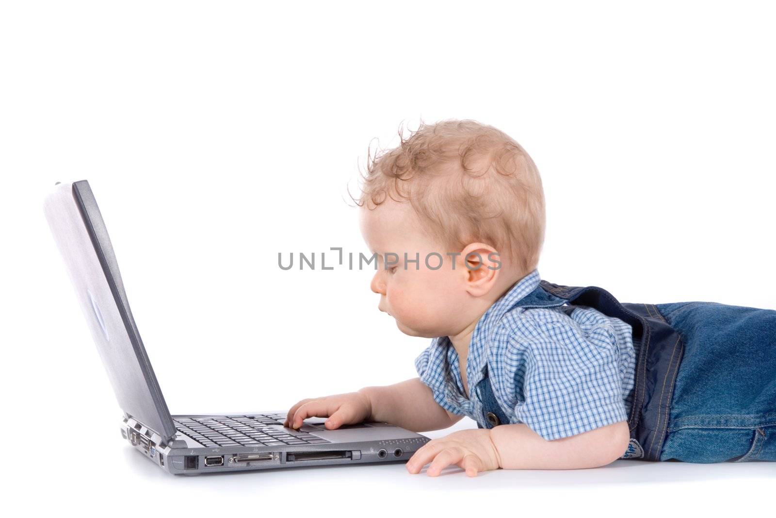 baby with laptop on white