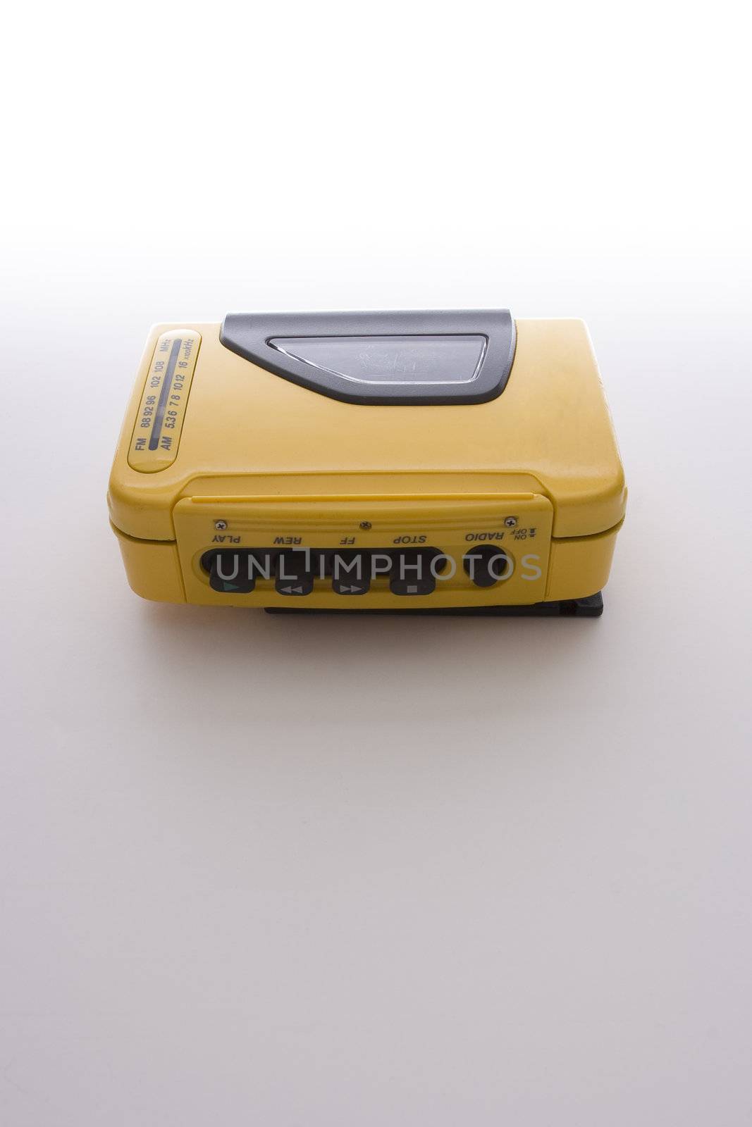 vintage yellow walkman from the 90's era