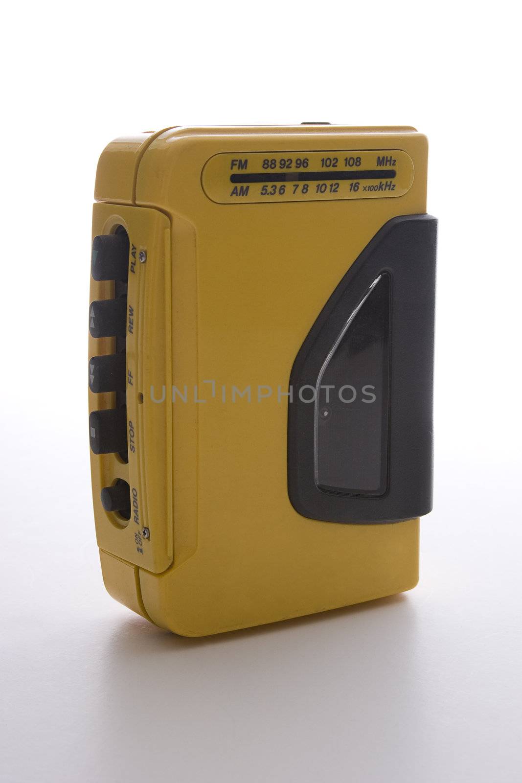 vintage yellow walkman from the 90's era