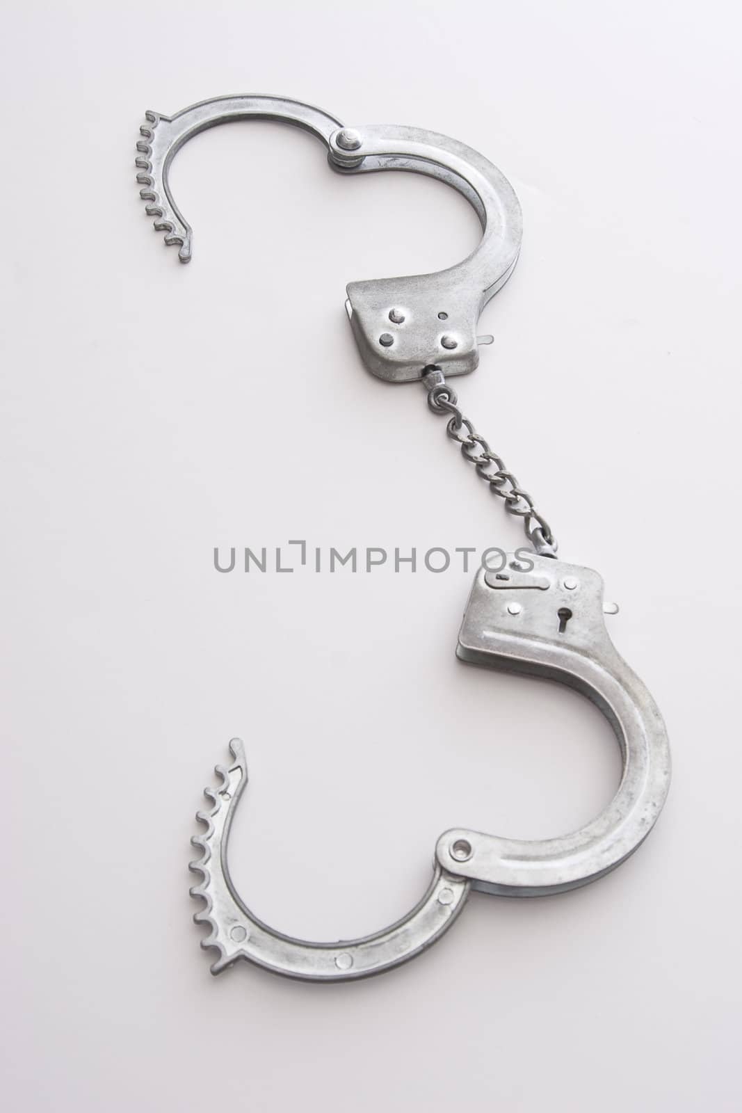 Open metal chained handcuffs