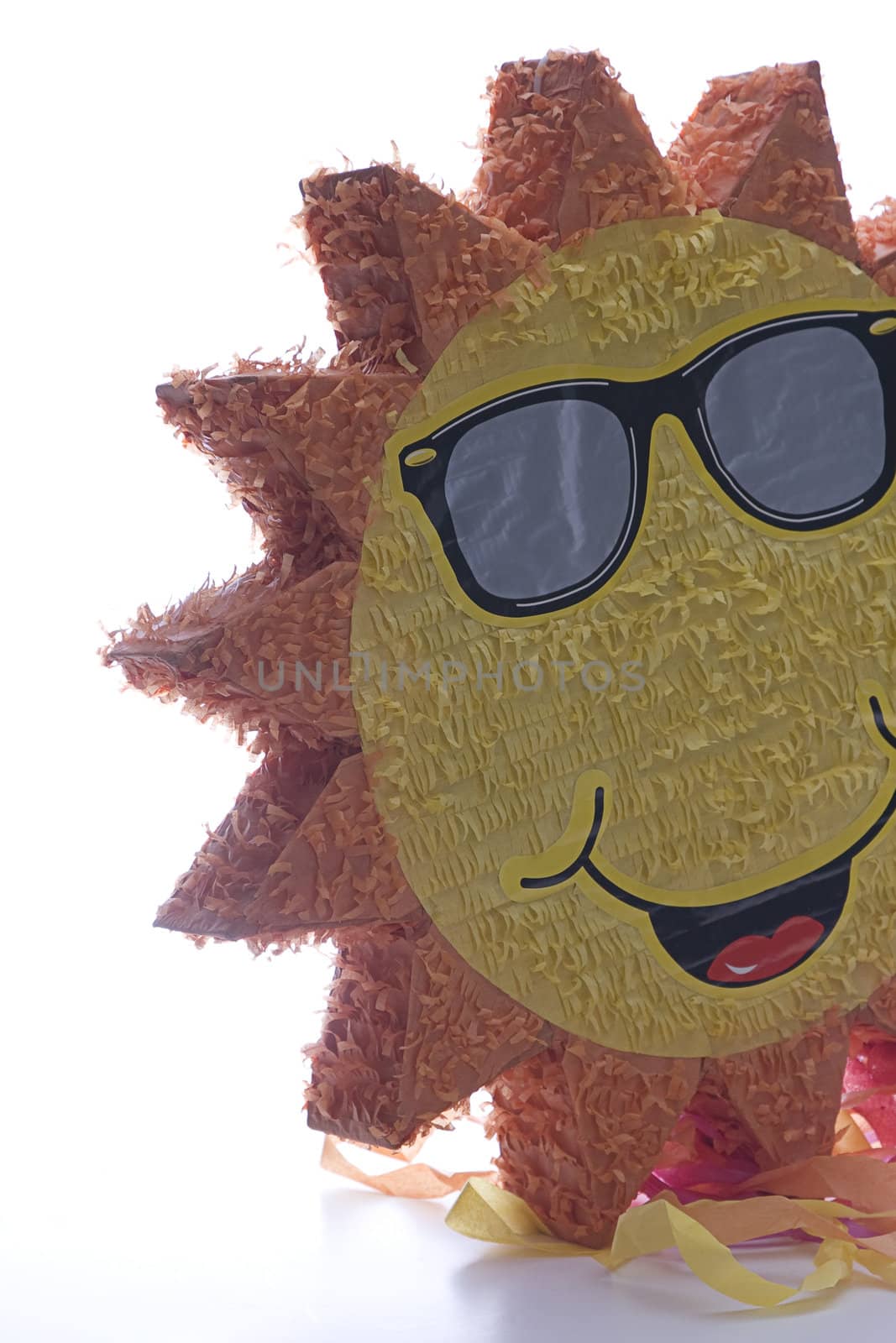 Back lite pinata, the pinata is a sun wearing sunglasses