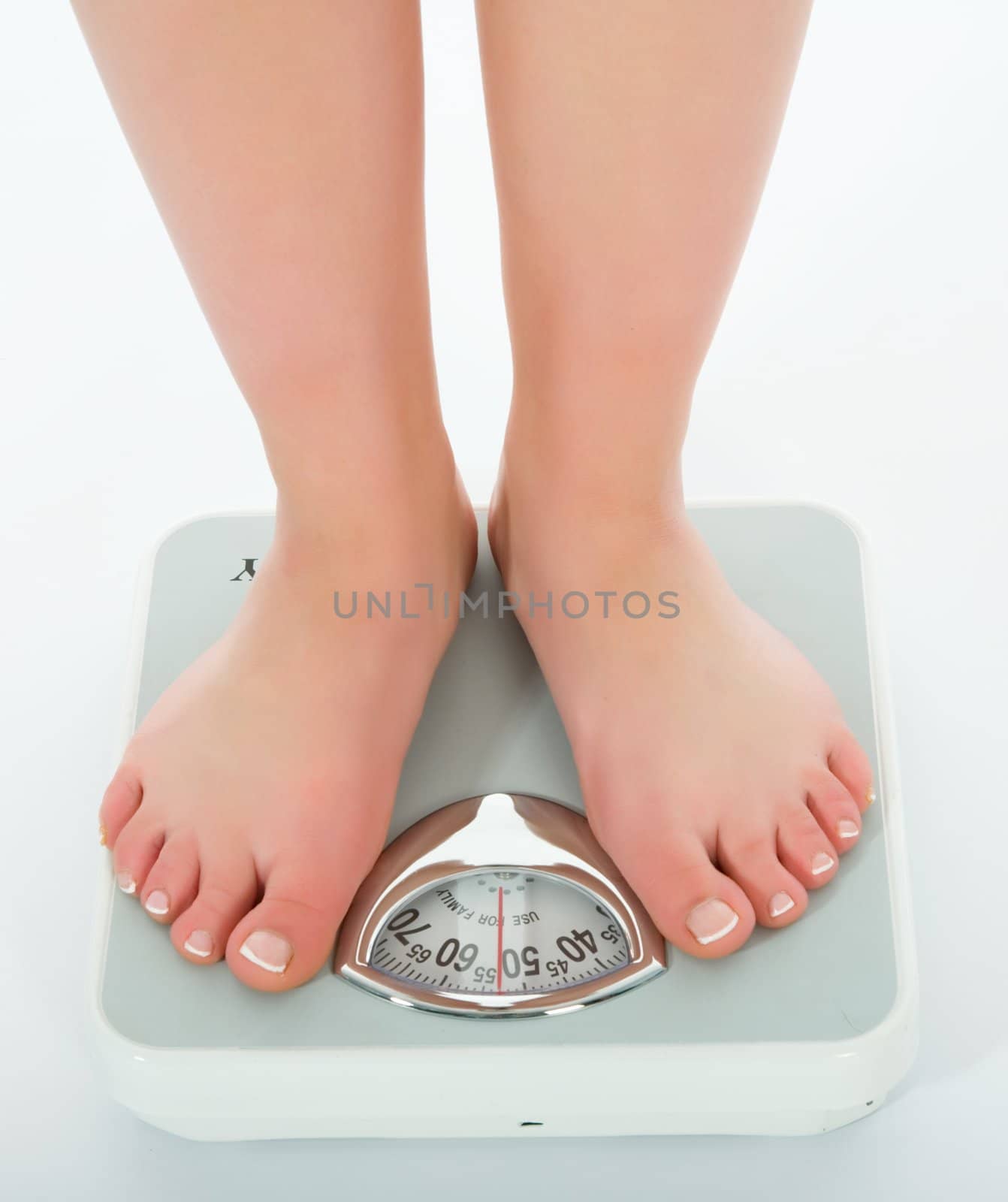 beautiful woman legs with  scales on white