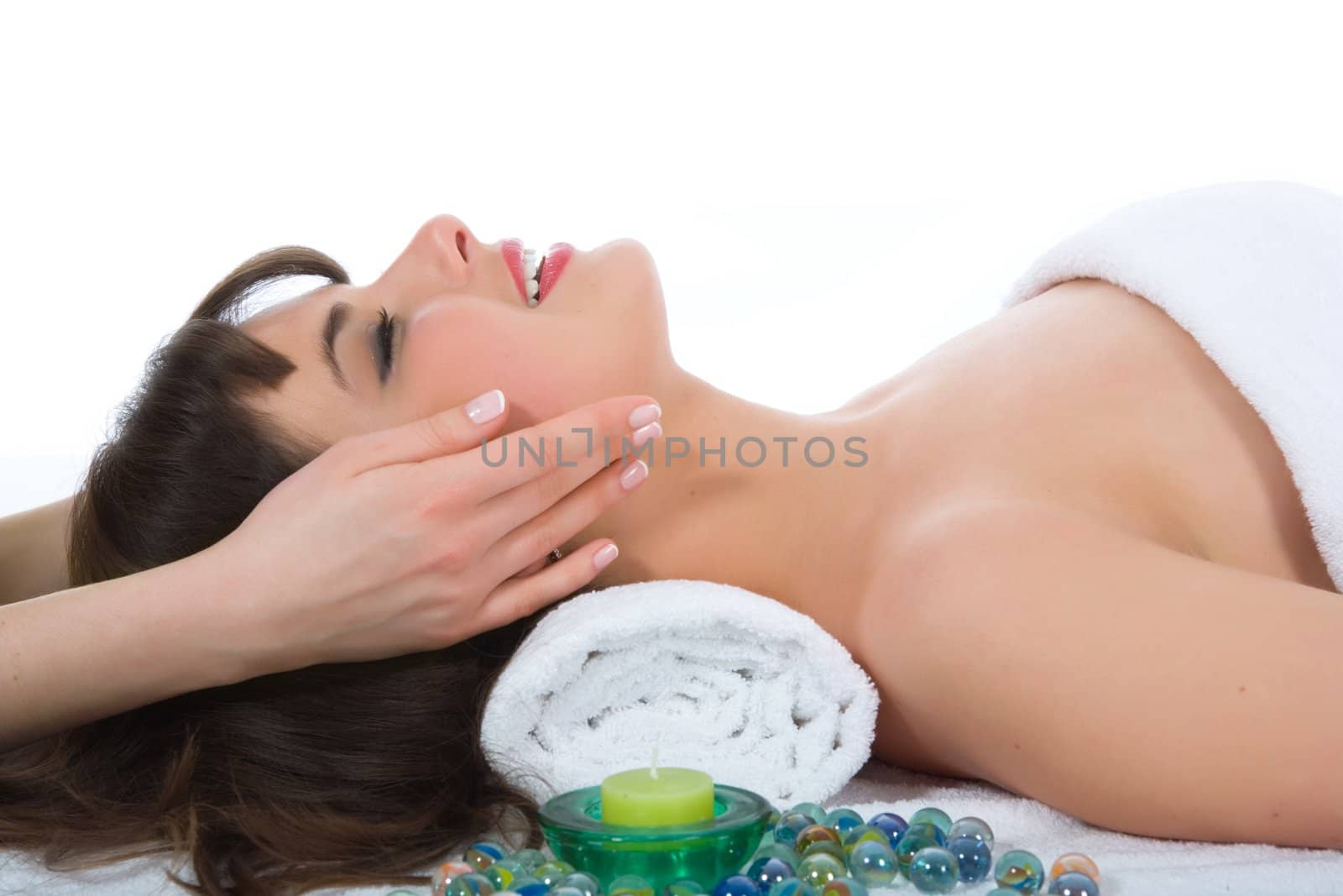 Attractive woman getting spa treatment on white