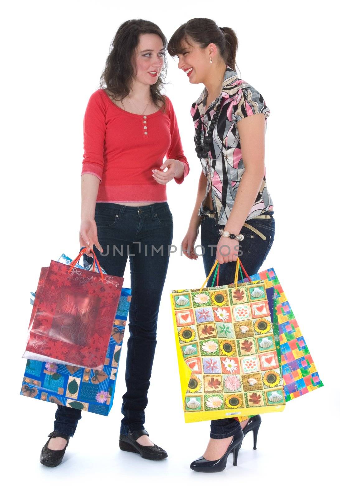 expressive girls  on white background  shopping