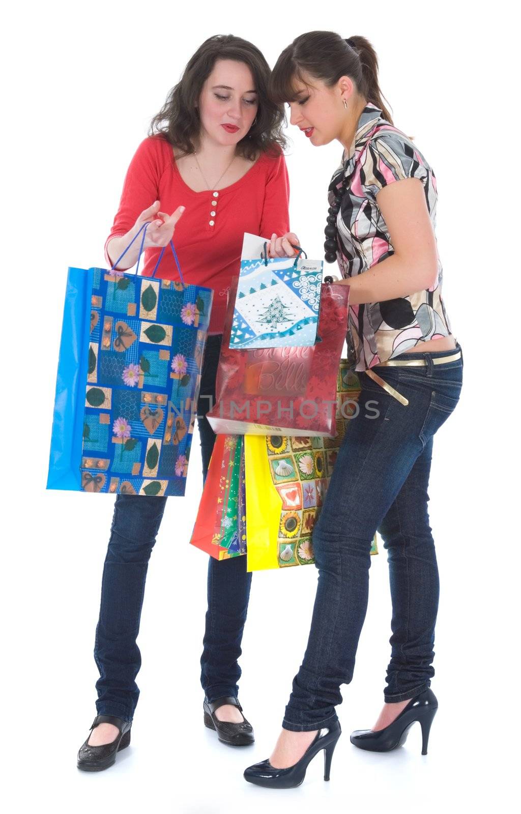 expressive girls  on white background  shopping