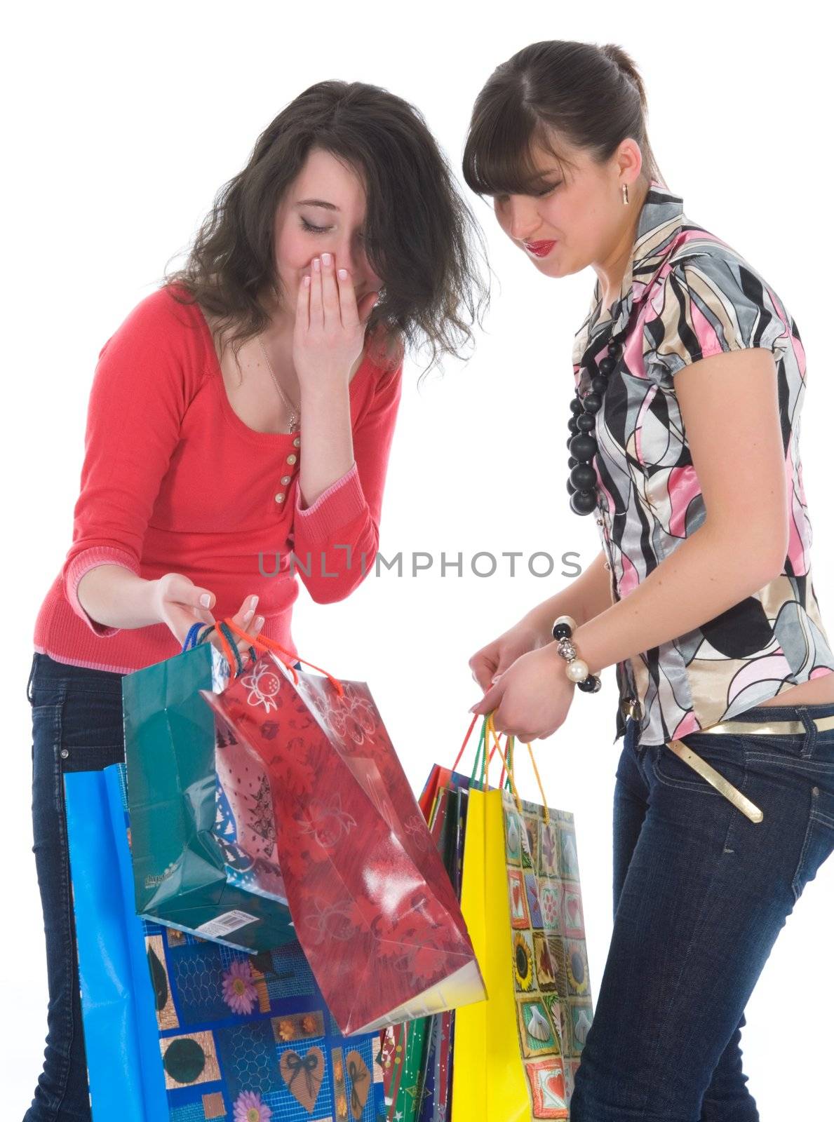 expressive girls  on white background  shopping