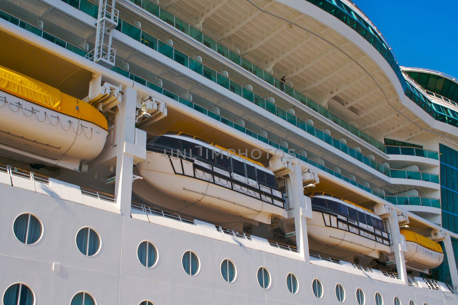 Cruise ship hull, balconies & rescue boats.