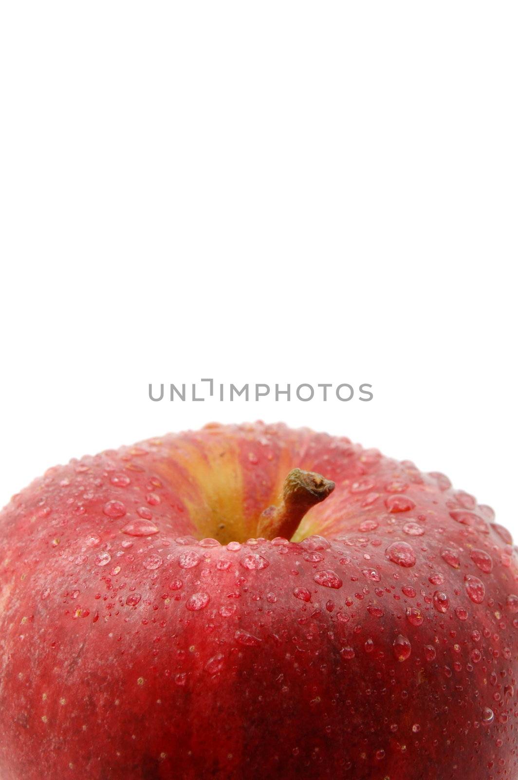 fresh red apple with water drops isolated on white background