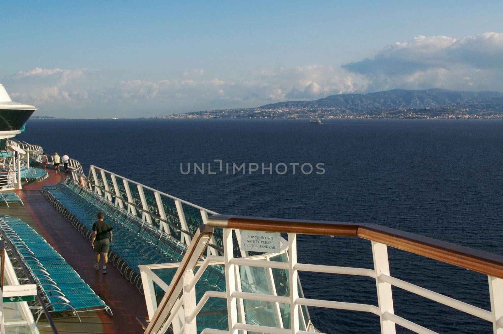 Cruise ship deck abstract shot with deck chairs.