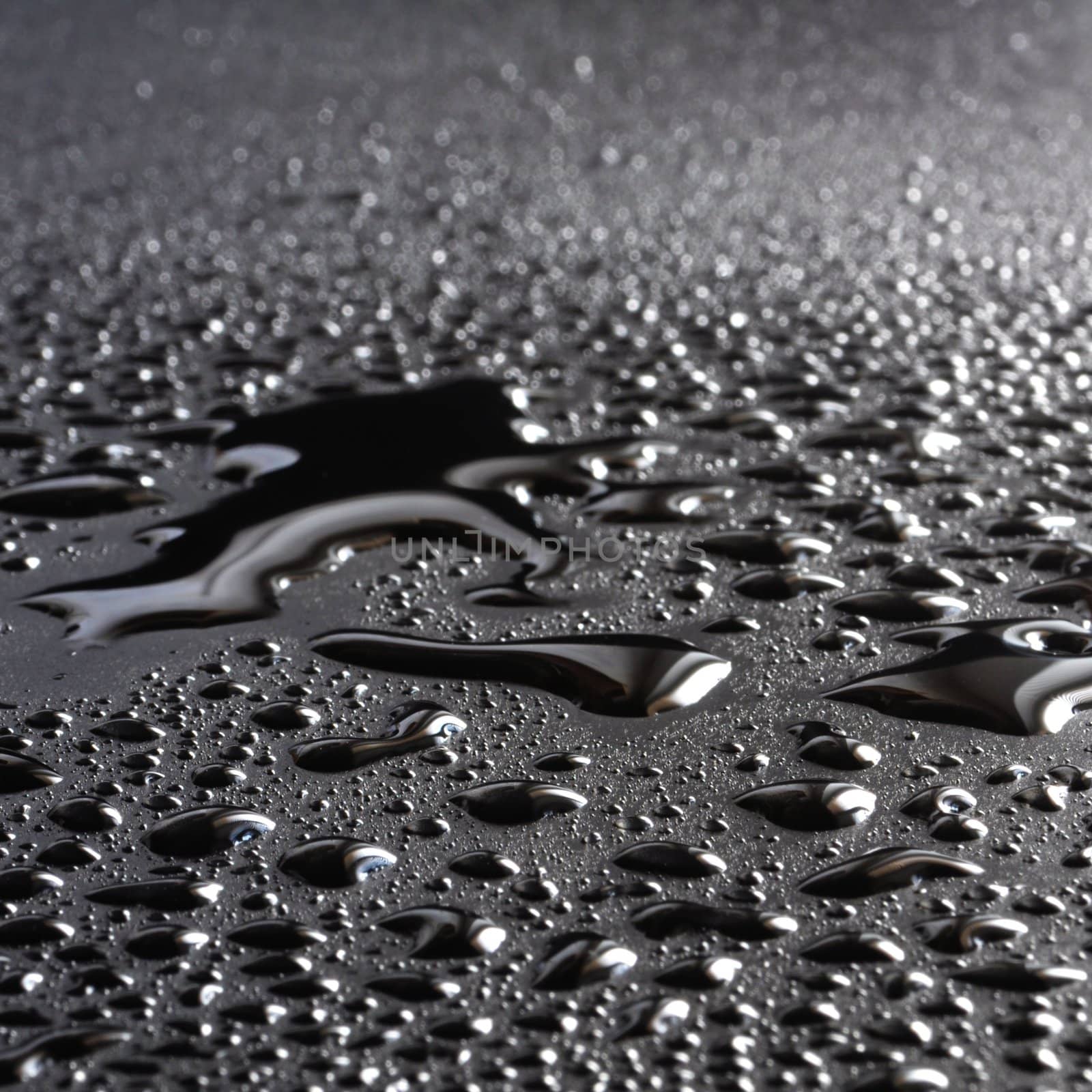 water drops on a metal surface showing freshness concept